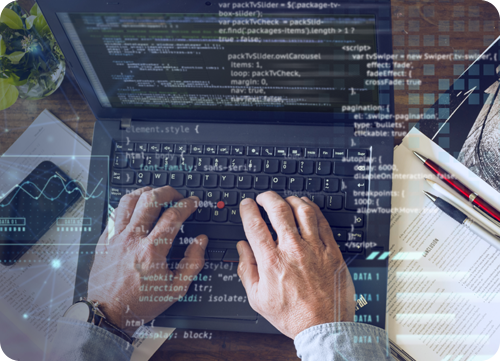 A Person Doing His Web Development Work On Computer Using Some Coding Languages.